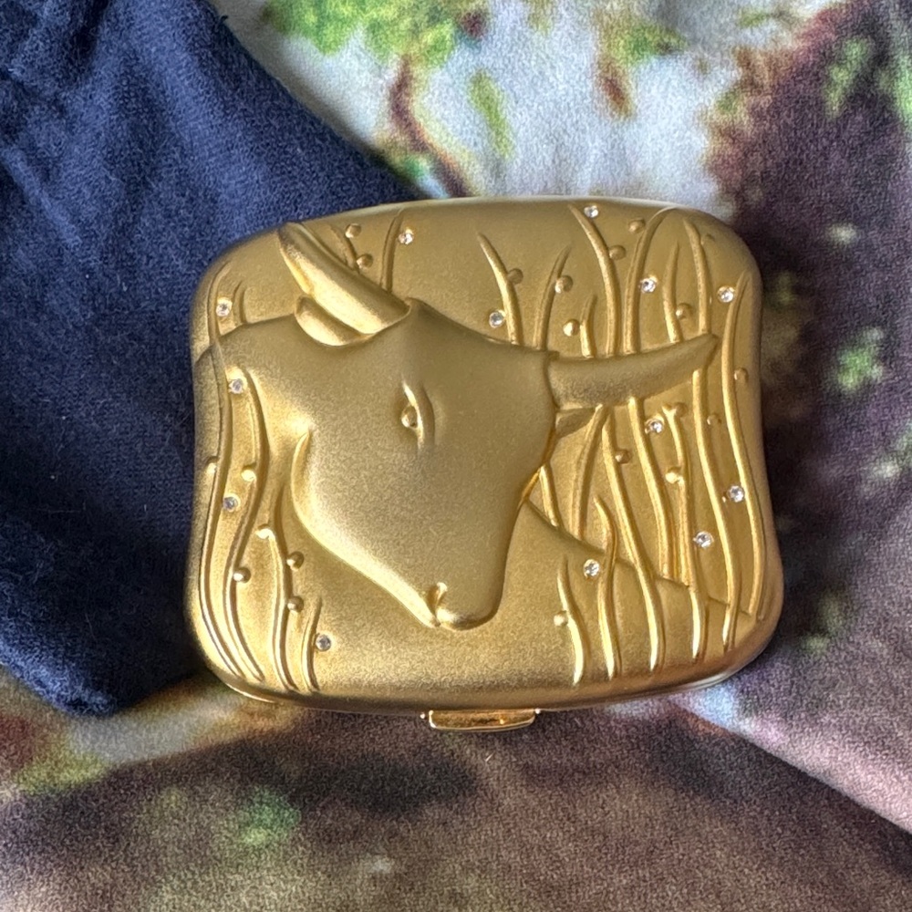 Vintage Estee Lauder Gold Compact with Bull Design